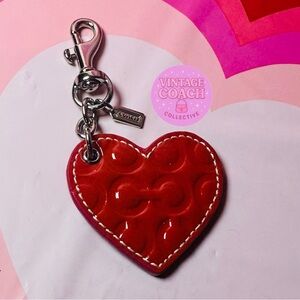 Coach heart charm